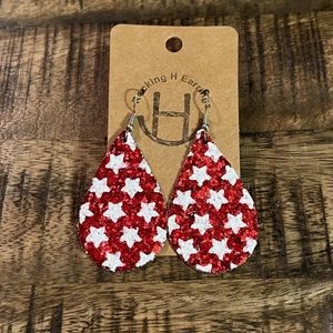 New red star faux leather earrings